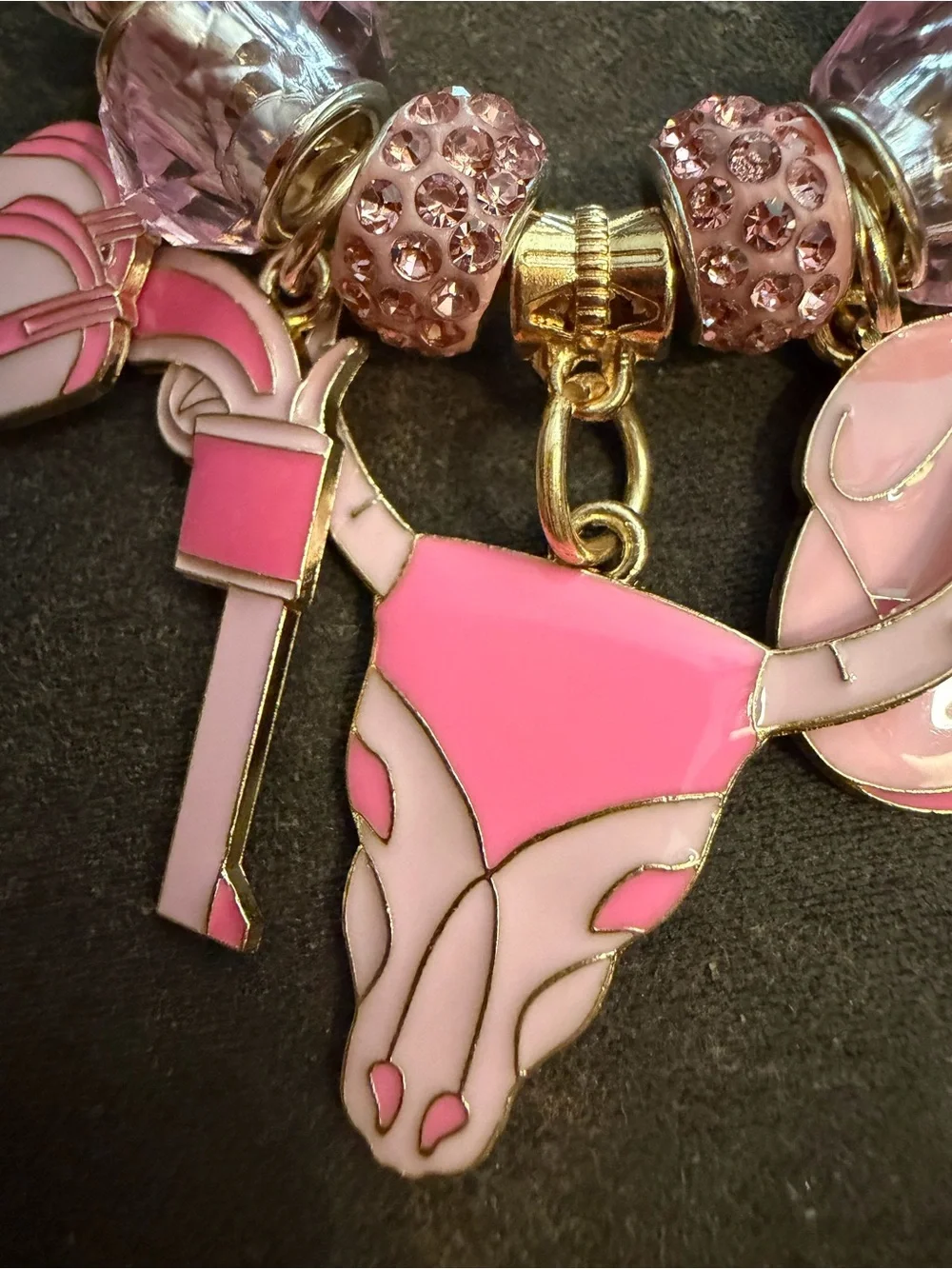 Gold-Tone Pink Charm Bracelet with Crystal Beads